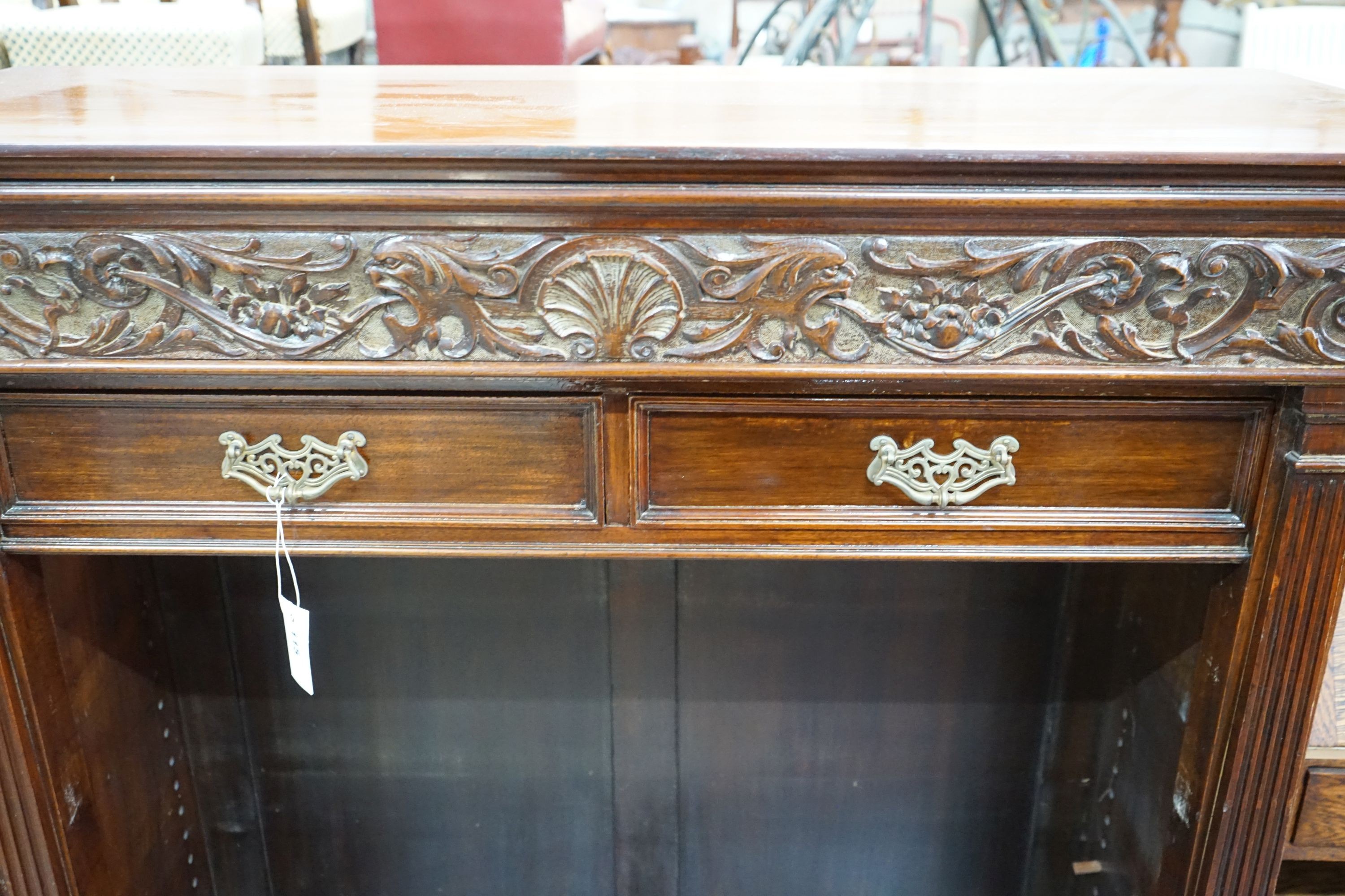 A late Victorian mahogany open bookcase, width 114cm, depth 46cm, height 125cm